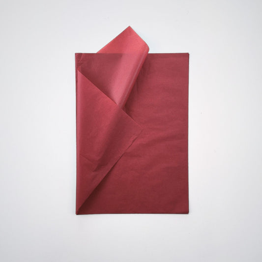 Deep Crimson tissue paper adds a bold pop of color to gift wrapping, crafting, and product packaging. Perfect for small business owners and creatives.