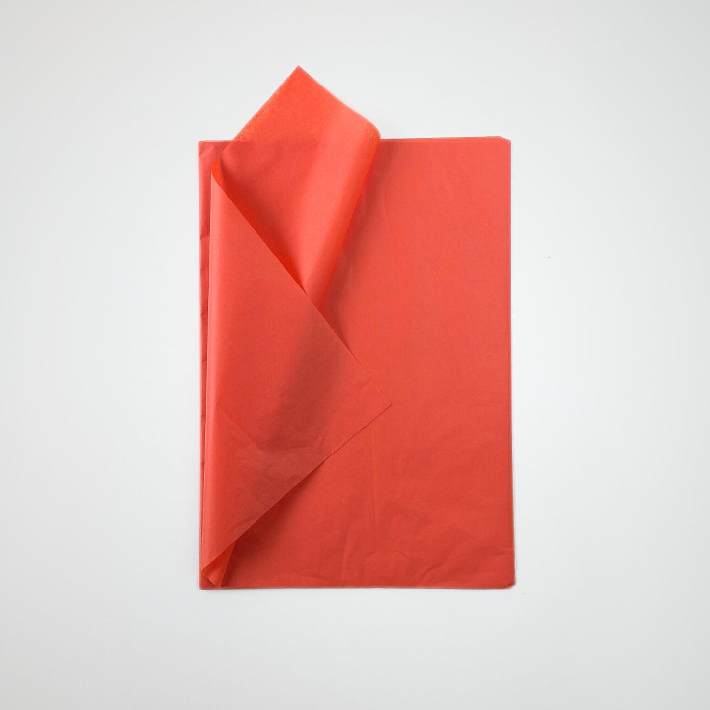 Ember Orange tissue paper adds a bold pop of color to gift wrapping, crafting, and product packaging. Perfect for small business owners and creatives.