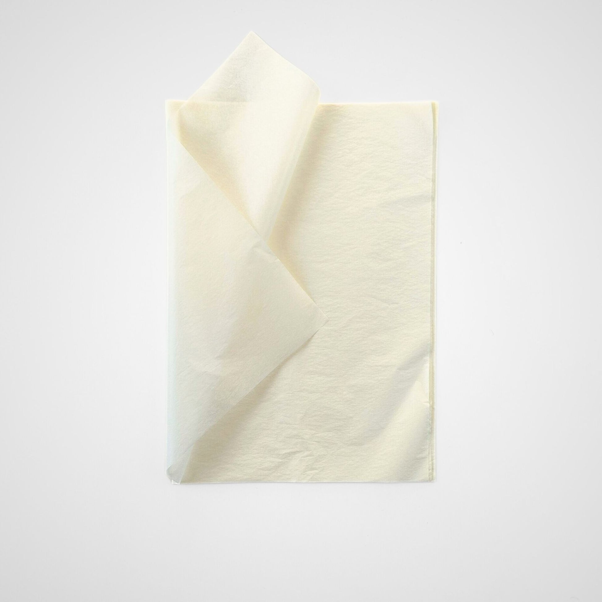 Ivory Cream tissue paper adds a bold pop of color to gift wrapping, crafting, and product packaging. Perfect for small business owners and creatives.