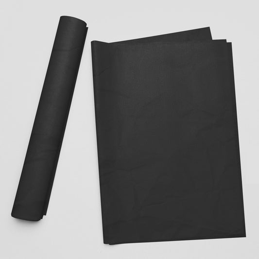 True Black tissue paper adds a bold pop of color to gift wrapping, crafting, and product packaging. Perfect for small business owners and creatives.
